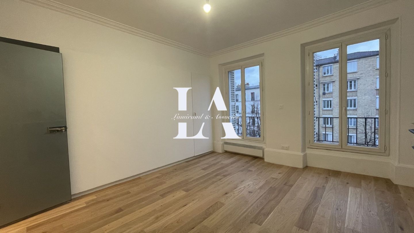 Paris 18e - 60m² - 3p. - 2ch.